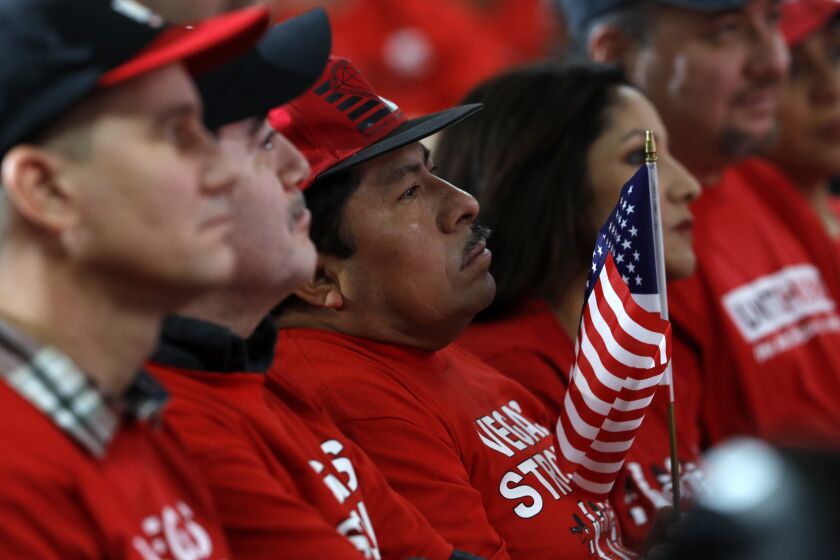 Union members listen to Democratic presidential candidate and former Vice President Joe Biden during town hall meeting at the Culinary Union, Local 226, headquarters in Las Vegas Wednesday, Dec. 11, 2019. (Steve Marcus/Las Vegas Sun via AP)