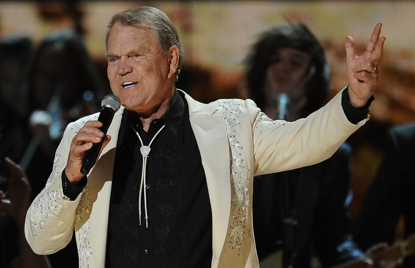 Country music legend Glen Campbell, known for "Rhinestone Cowboy" and more among his 75 chart hits, died on Aug. 8, 2017, after a long and public battle with Alzheimer's Disease. He was 81. Read more.