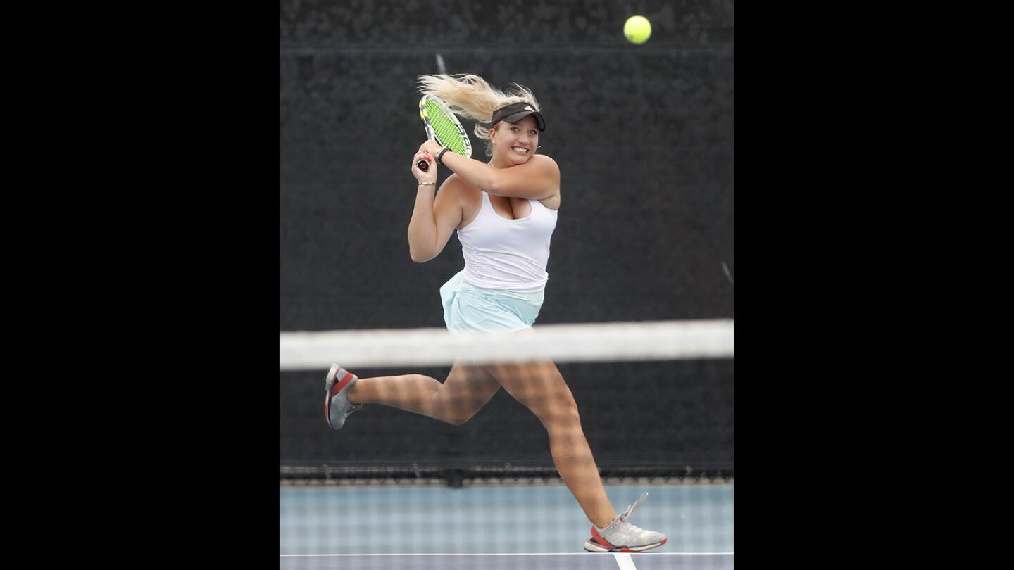 Corona del Mar High's Kristina Evloeva competes in a No. 1 singles set against Manhattan Beach Mira Costa during a nonleague match on Wednesday, Oct. 3.