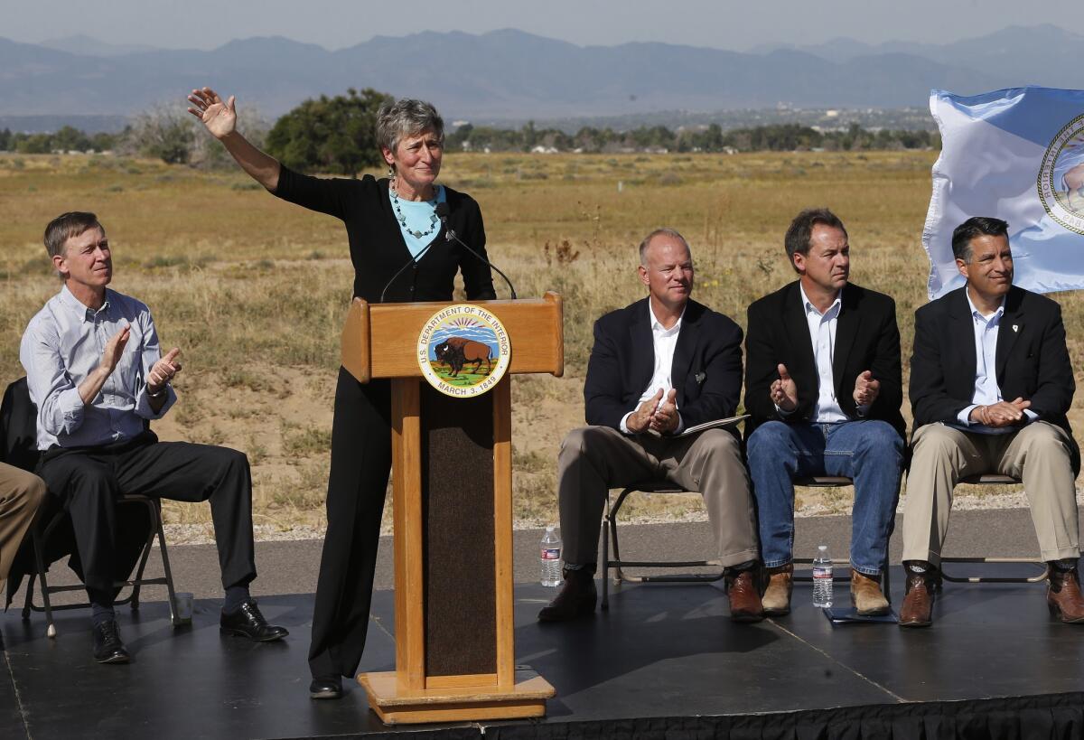 Interior Secretary Sally Jewell gestures while speaking at Rocky Mountain Arsenal National Wildlife Refuge, in Commerce City, Colo., on Sept. 22. Seated onstage are the governors of Nevada, Colorado, Wyoming and Montana.