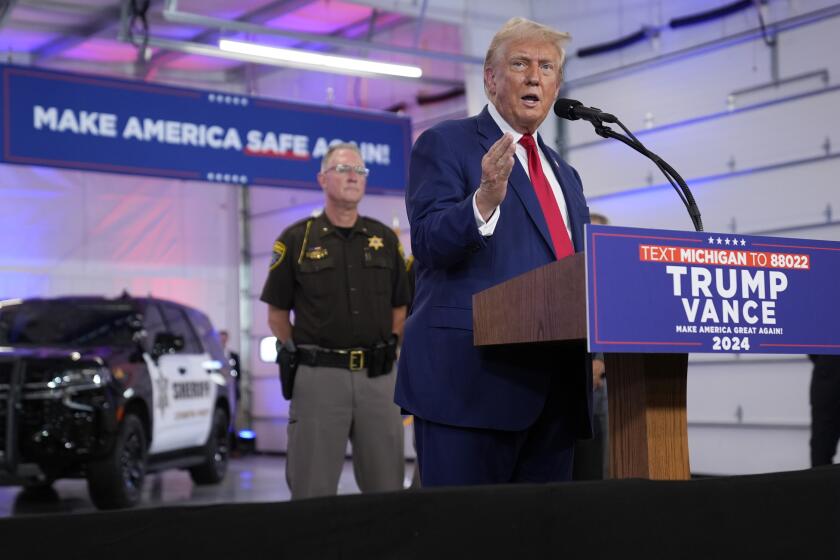 Republican presidential nominee former President Donald Trump speaks on crime and safety during a campaign event at the Livingston County Sheriff's Office, Tuesday, Aug. 20, 2024, in Howell, Mich. (AP Photo/Evan Vucci)