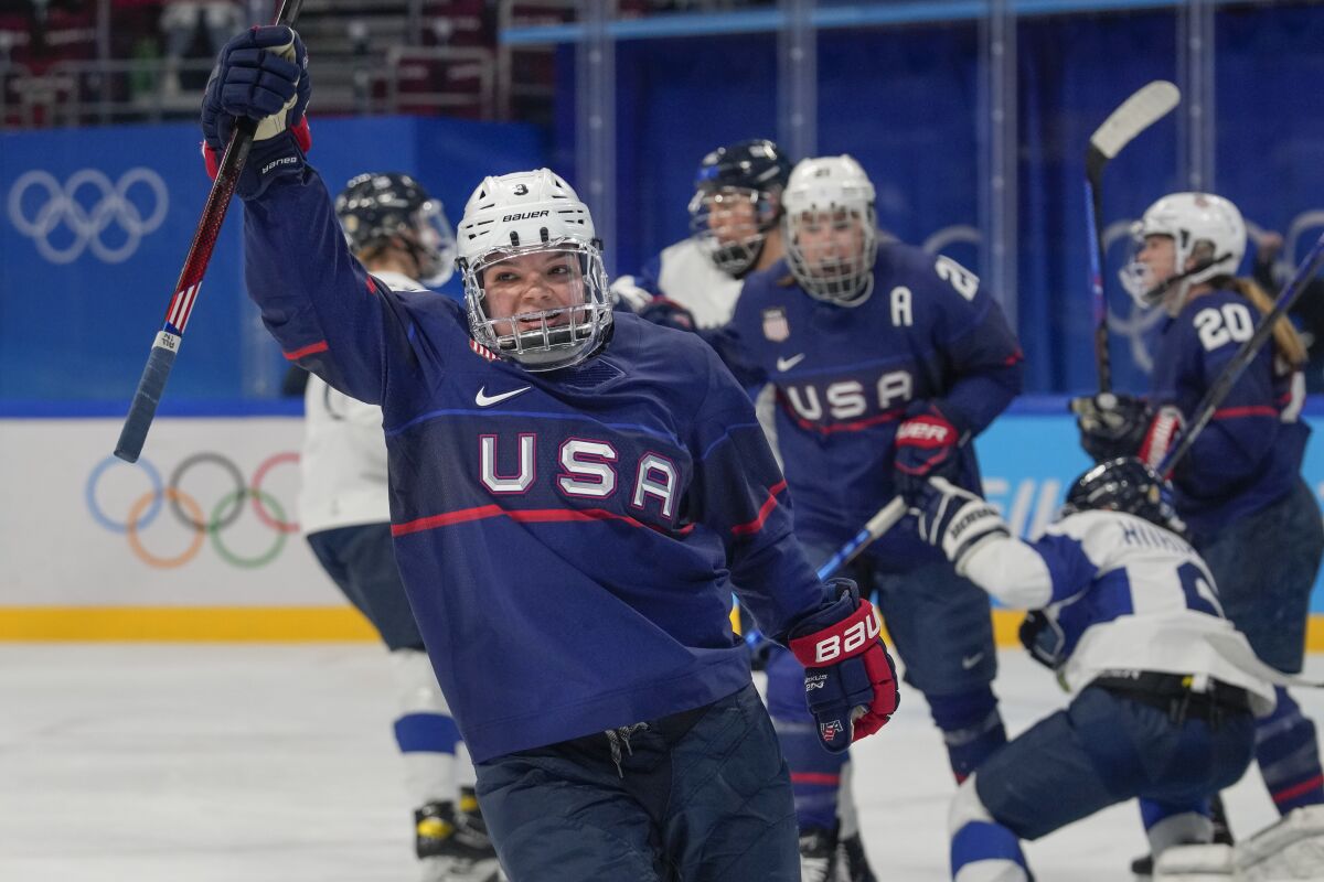 United States' Cayla Barnes (3) celebrates after scoring a goal against Finland during a women's semifinal hockey game at the 2022 Winter Olympics, Monday, Feb. 14, 2022, in Beijing. (AP Photo/Petr David Josek)