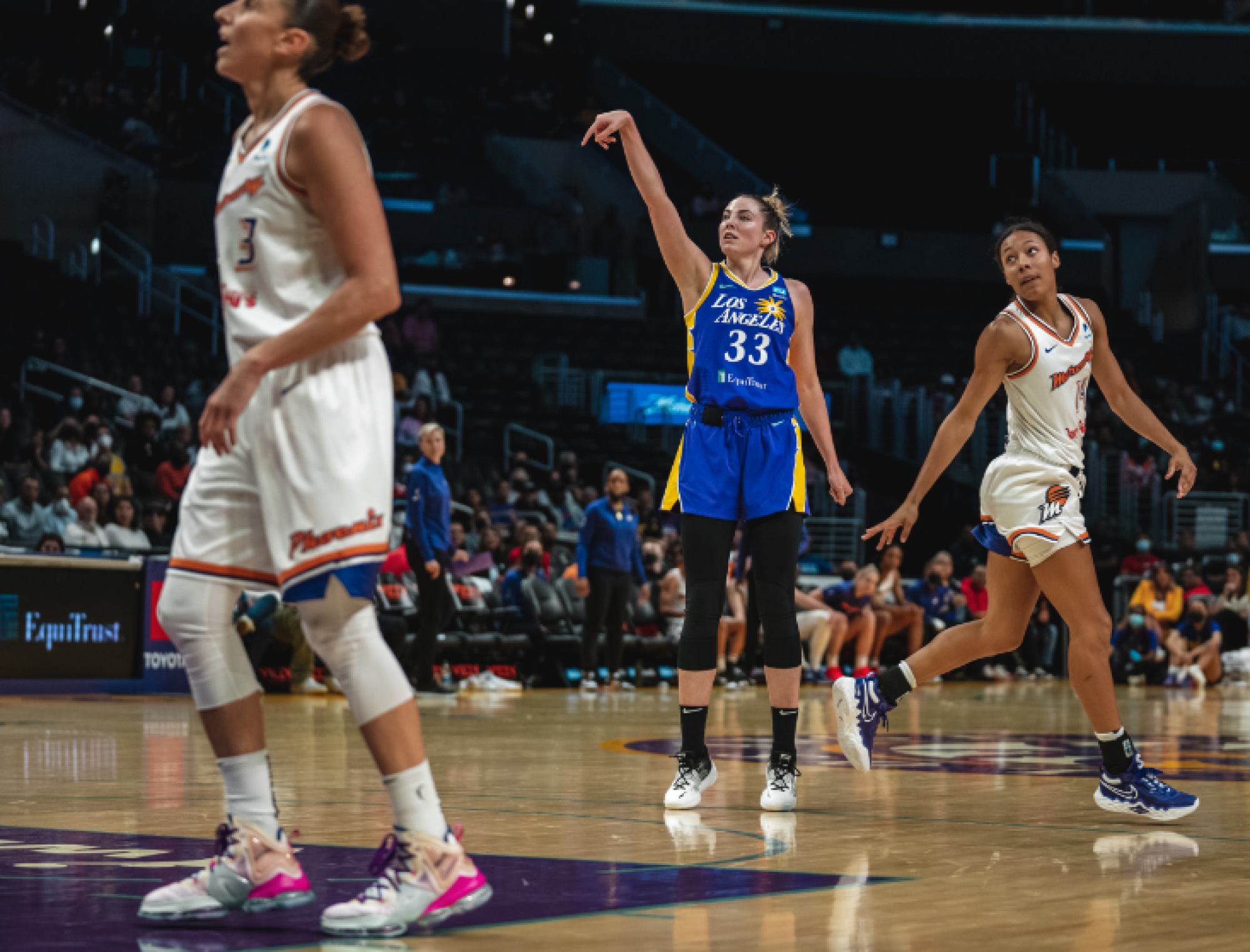 Sparks forward Katie Lou Samuelson follows through on a three-point shot.