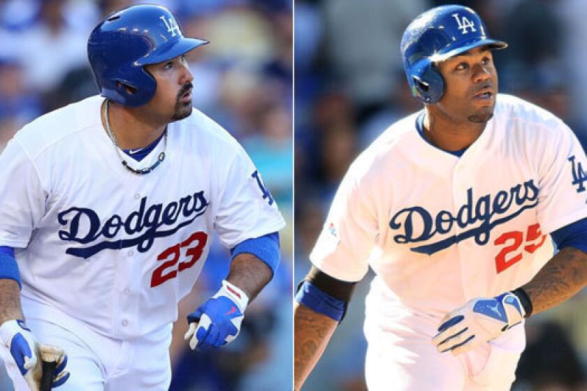 Former Red Sox Adrian Gonzalez, left, and Carl Crawford may now be Dodgers teammates, but they are still on the minds of folks in Boston.