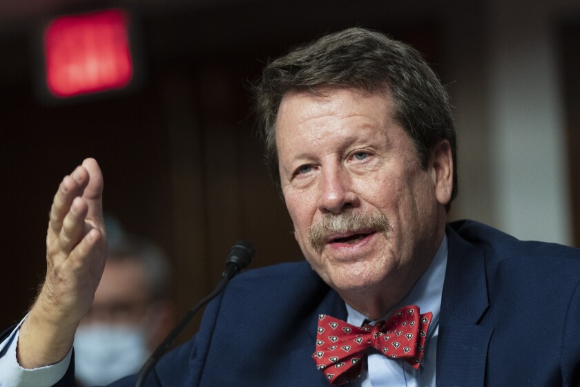 Robert Califf testifies before a Senate Committee on Health, Education, Labor and Pension hearing on the nomination to be commissioner of Food and Drug Administration on Capitol Hill in Washington, Tuesday, Dec. 14, 2021. (AP Photo/Manuel Balce Ceneta)
