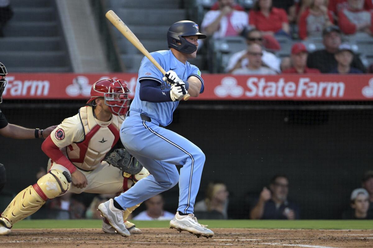 Will Wagner of Toronto singles in the third inning Monday at Angel Stadium.