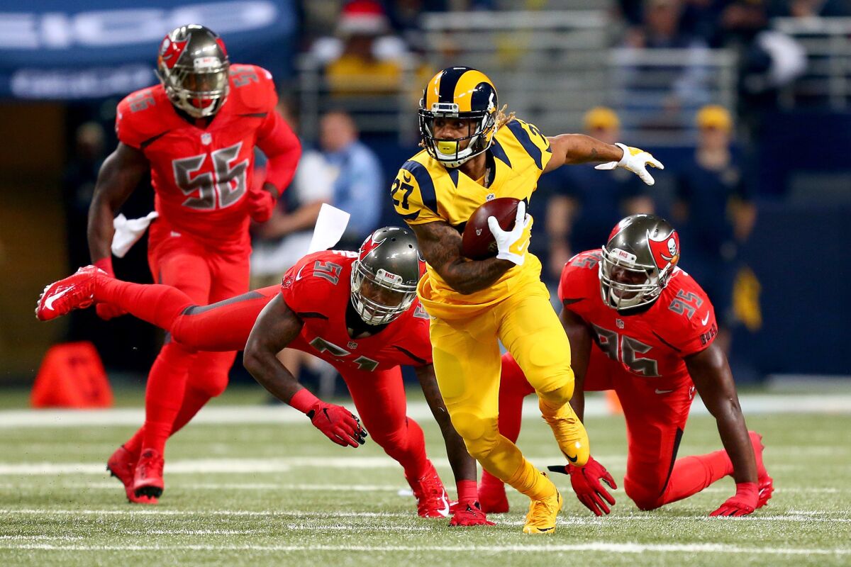 Running back Tre Mason finds some room to run against Tampa Bay during the Rams' 31-23 victory over the Buccaneers on Dec. 17.