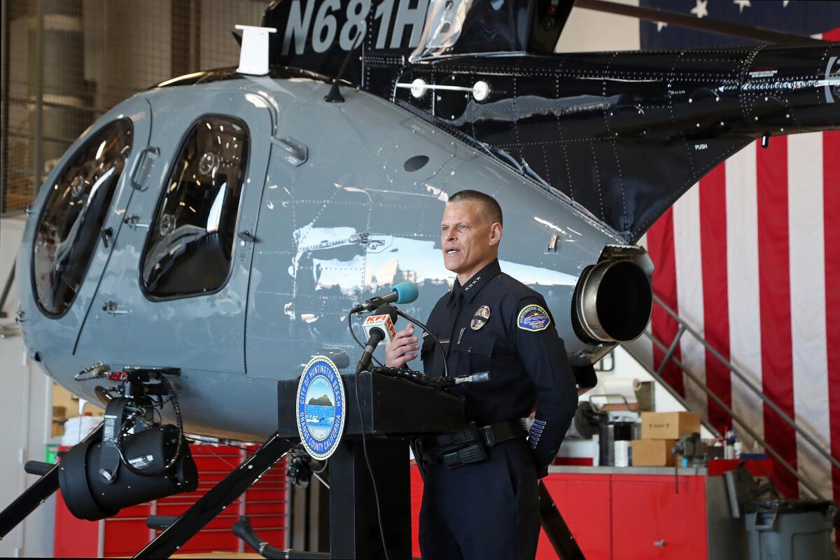 Huntington Beach Police Chief Eric Parra speaks during a press conference for a new police helicopter on Wednesday morning.
