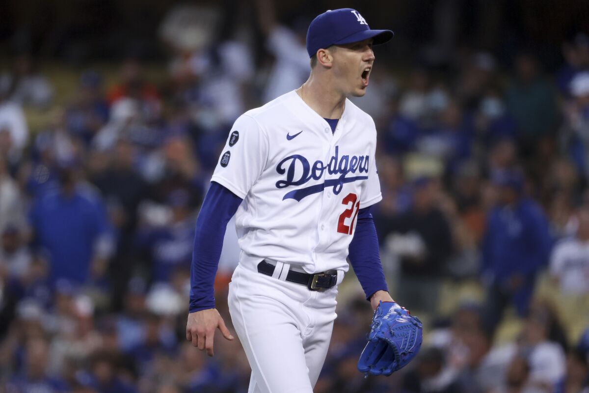 Walker Buehler reacts after the final out of the first inning during Game 4 of the NLDS against the Giants.