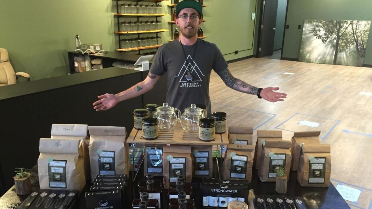 Jeremy Haley, 30, stands inside the Artisan's Apothecary in Denver, where he hopes to sell kratom, a plant used to treat drug addiction and other ailments.