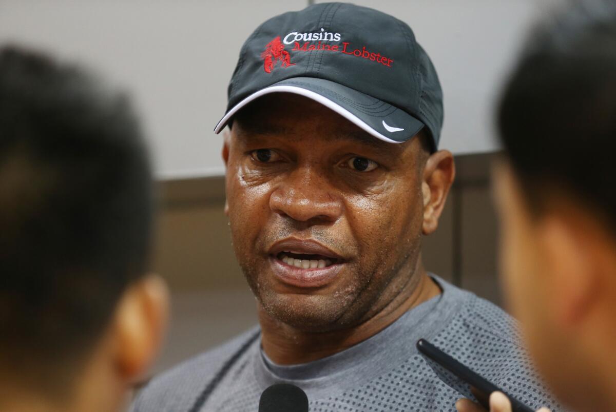 Clippers Coach Doc Rivers speaks to the media during a training session in Shenzhen, China on Oct. 10.