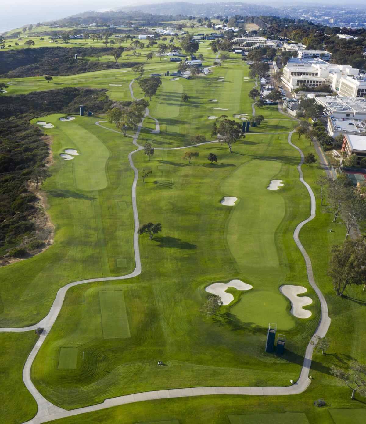 The 14th hole, left, and 10th hole, right, of the Torrey Pines South Course.