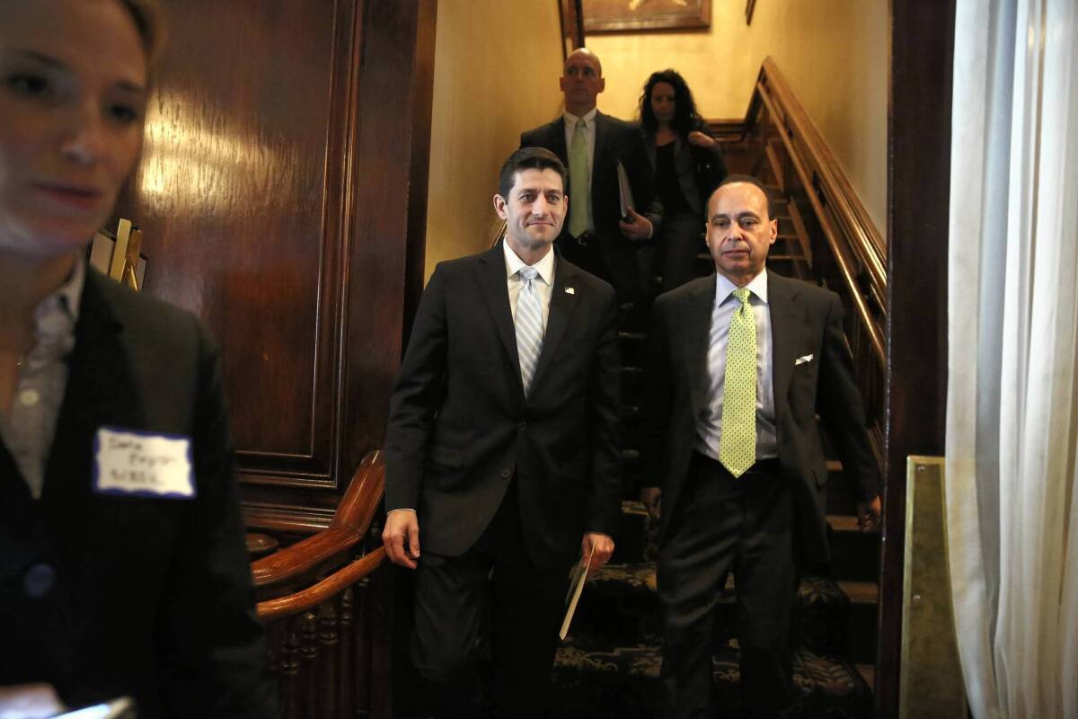 Rep. Paul Ryan (R-Wis.), left, made a joint appearance Monday at the City Club of Chicago with Rep. Luis Gutierrez (D-Ill.), a leading backer of immigration reform.