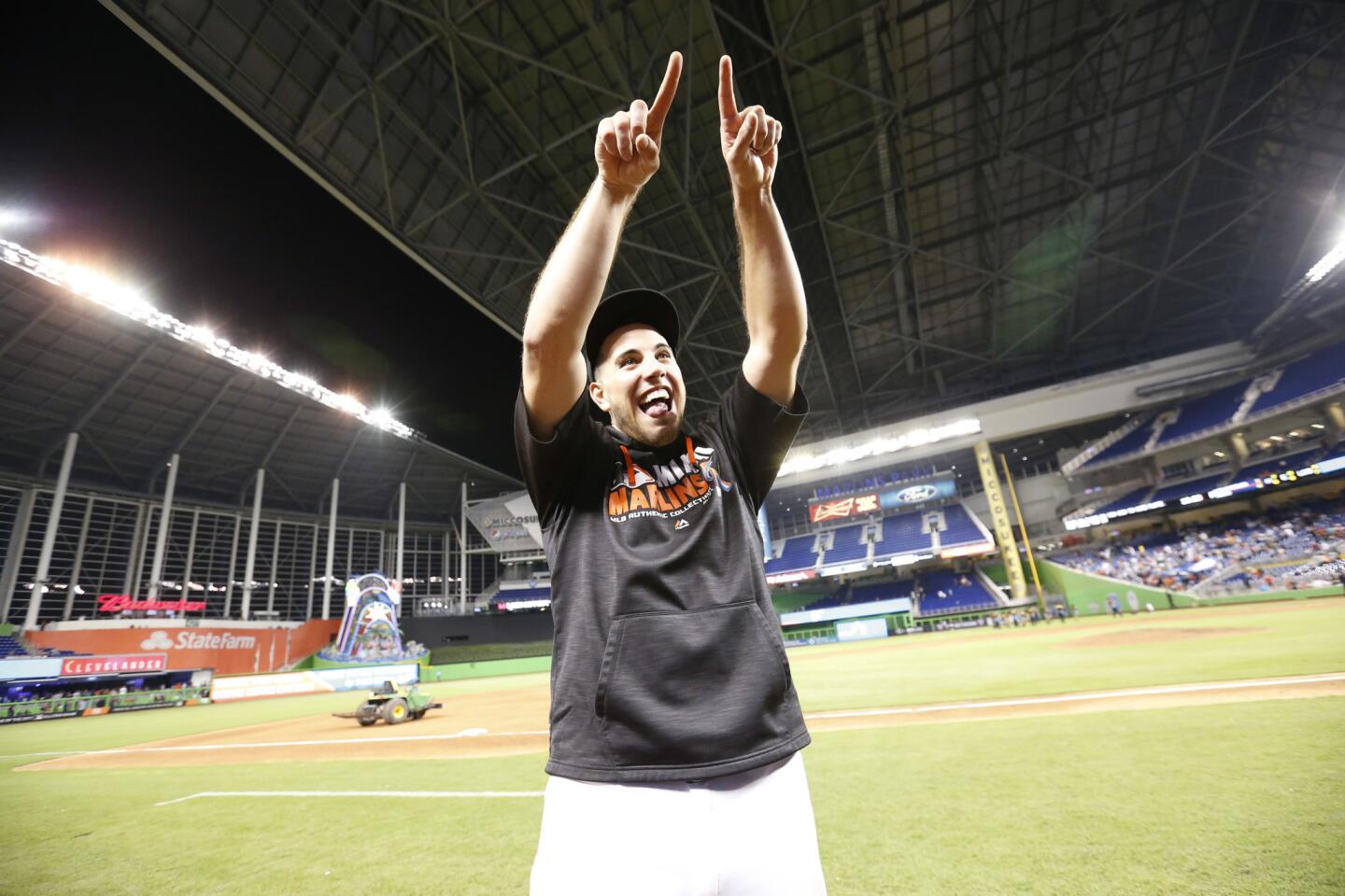 Miami Marlins starting pitcher Jose Fernandez gestures to the stands after the Marlins defeated the Los Angeles Dodgers in a baseball game, Friday, Sept. 9, 2016, in Miami. Fernandez tied a career high with 14 strikeouts. (AP Photo/Wilfredo Lee)
