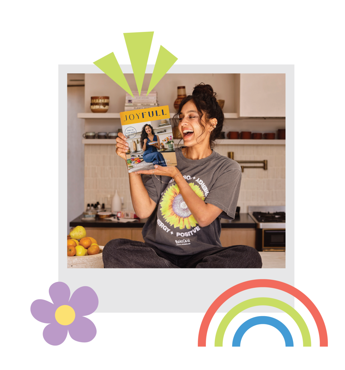 Photographic illustration in the form of a polaroid of a woman holding a book, with illustrations of rainbows, flowers and triangles.