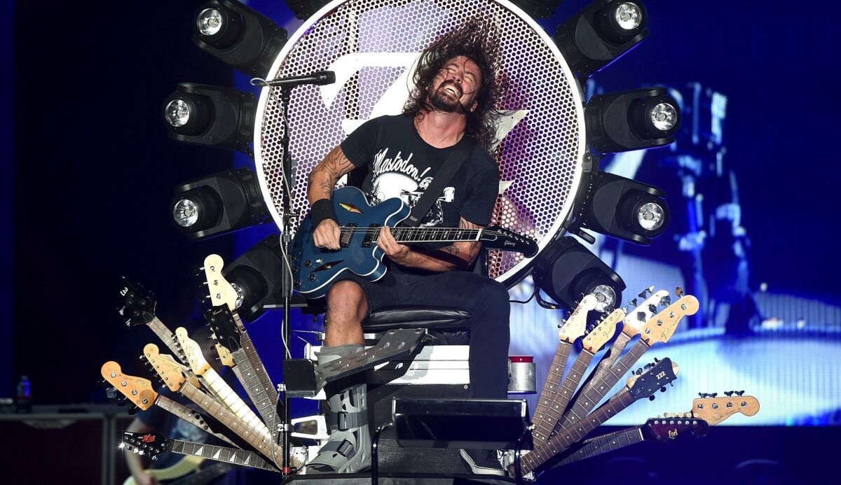 Dave Grohl of Foo Fighters performs Monday night at the Forum in Inglewood.