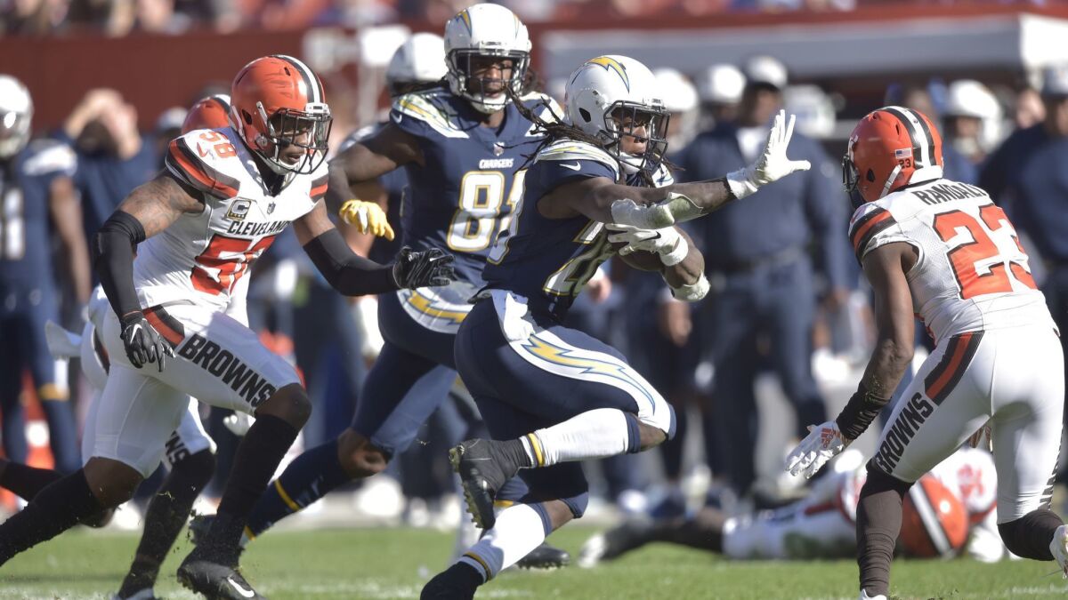 Melvin Gordon, shown running against Cleveland on Oct. 14, missed Sunday's game against Tennessee with a hamstring issue.
