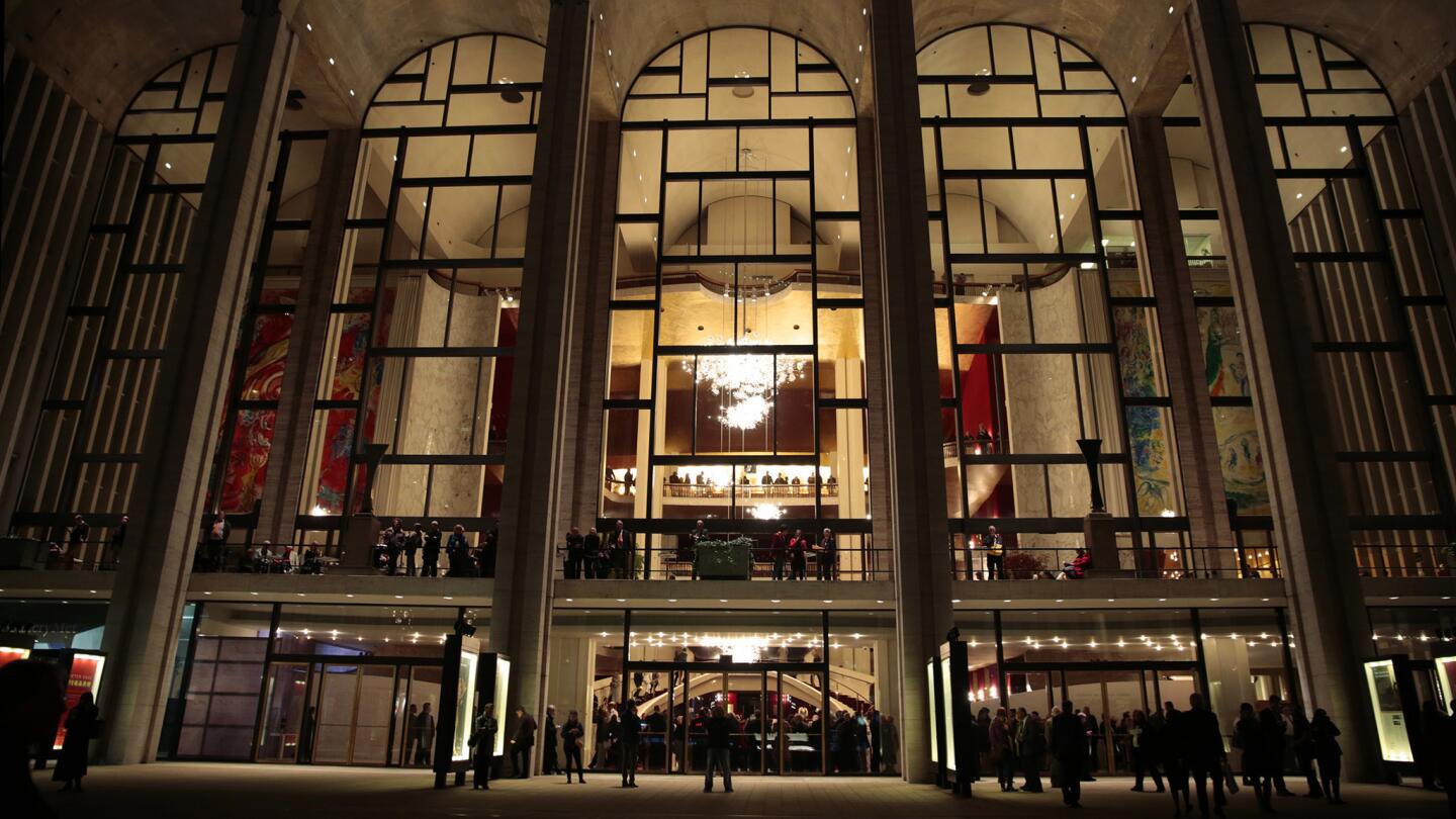 People gather inside the opera house on the opening night of "The Death of Klinghoffer," performed by the Metropolitan Opera in New York and written by John Adams. The opera is based on the 1985 hijacking of the Achille Lauro cruise ship and the killing of passenger Leon Klinghoffer.