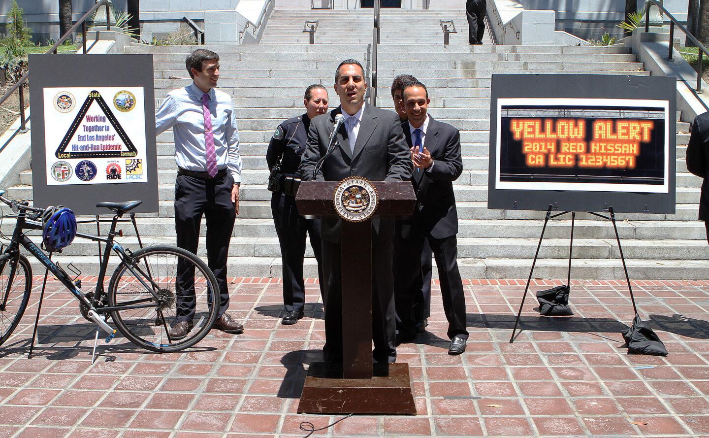 California Assemblyman Mike Gatto speaks at a press conference introducing Assembly Bill 47 and Assembly Bill 1532 which enforces broader and stiffer hit-and-run laws in California in front of Los Angeles City Hall on Wednesday, July 23, 2014. The bills, introduced by Gatto, represents joint interest and energy from the State level, City of Los Angeles level, and local level from Finish the Ride and The Los Angeles County Bicycle Coalition.