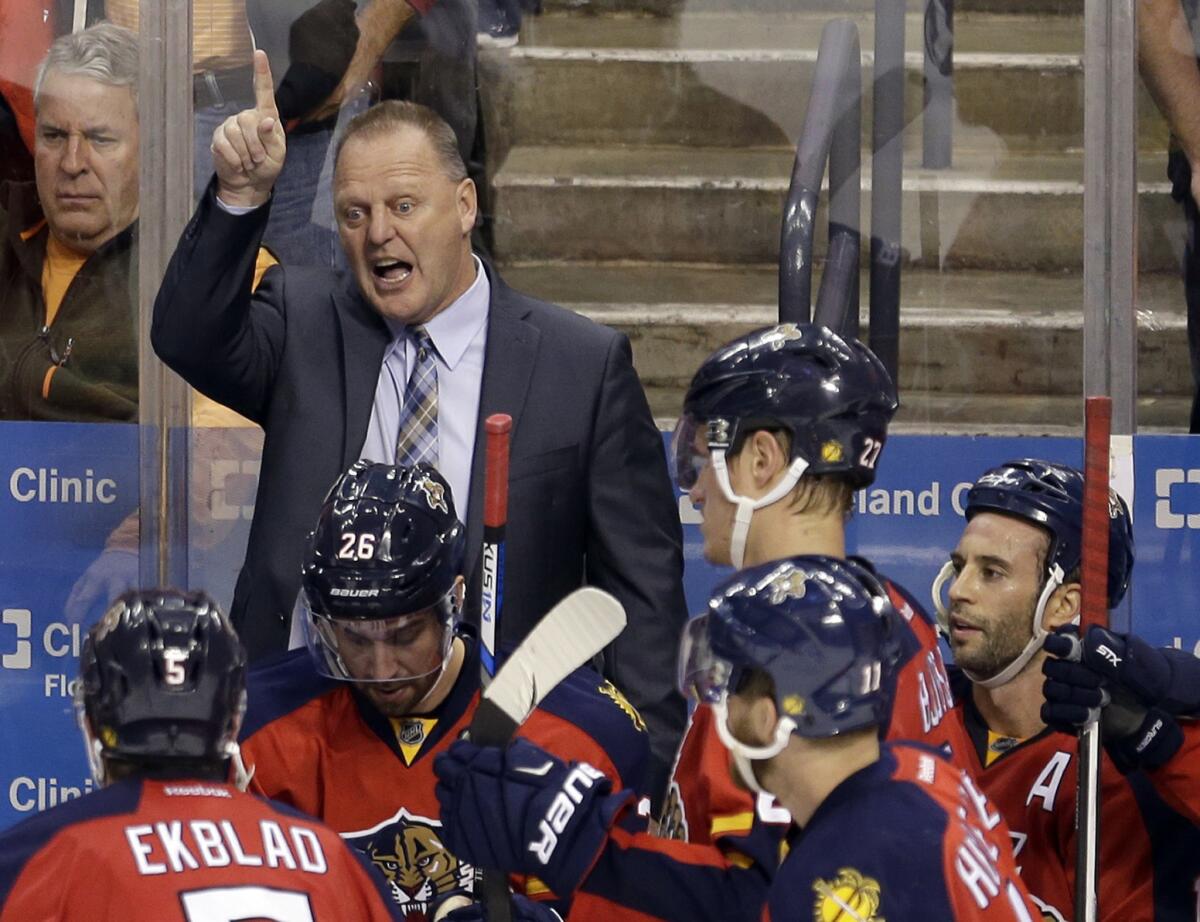 Florida Panthers Coach Gerard Gallant talks to players during a timeout in the third period of Game 1 of a first-round playoff series against the New York Islanders on April 14.