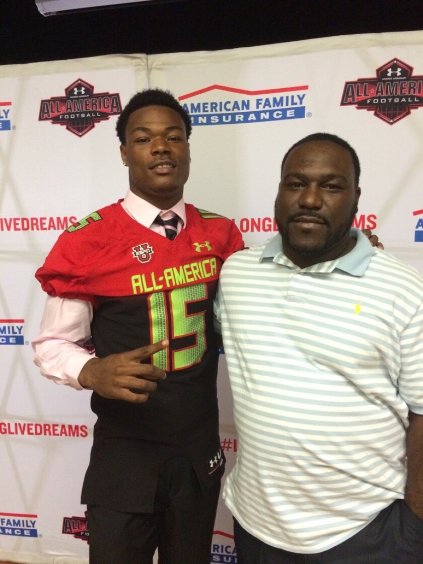 Derwin James Jr. and Sr. after Derwin Jr. was presented his jersey for the Under Armour All-American game in 2014.