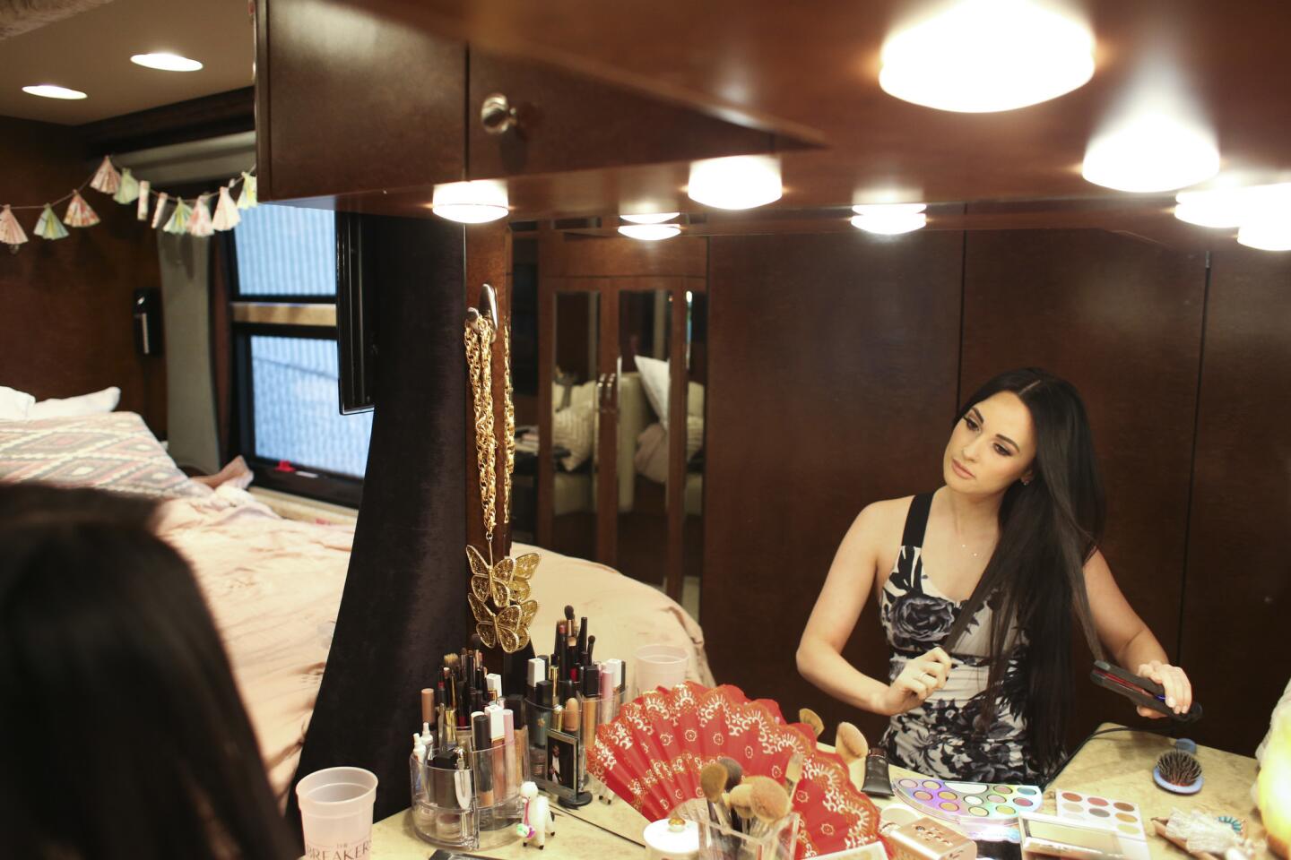 Kacey Musgraves prepares for her show at the U.S. Cellular Center in her tour bus.