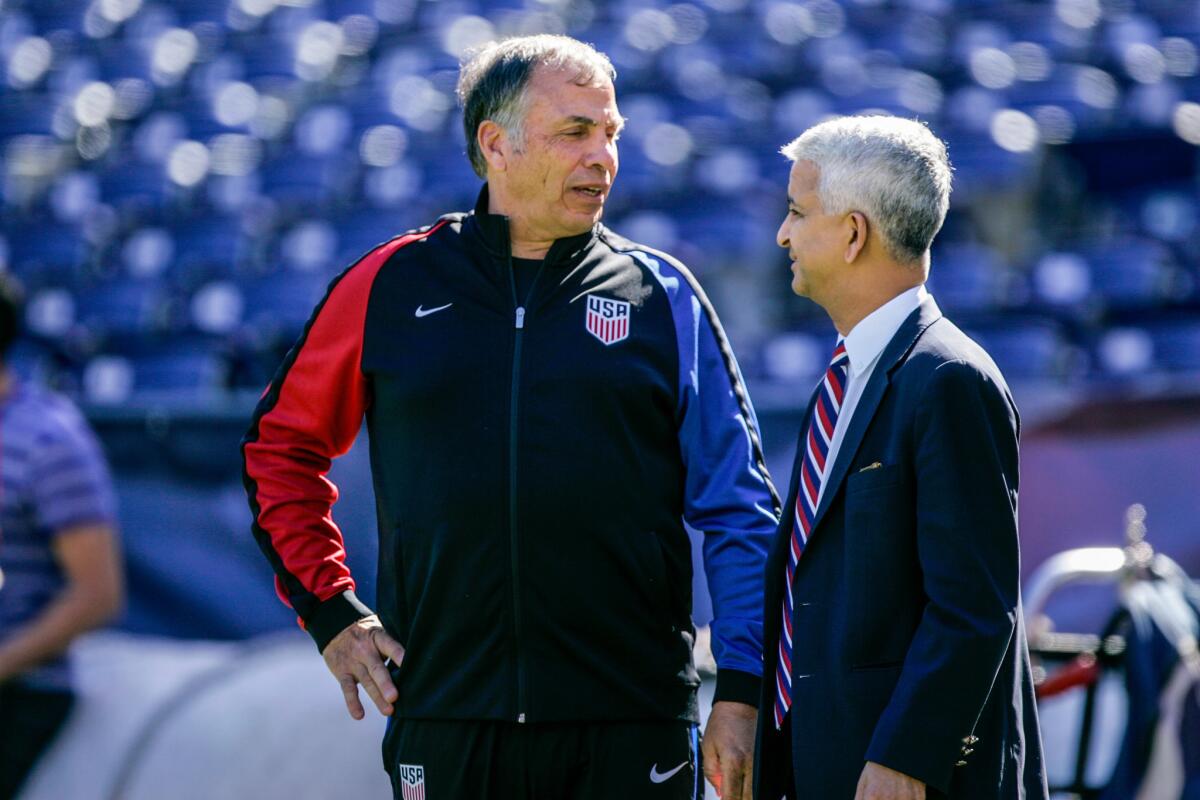 SAN DIEGO, CA - JANUARY 29: USMNT Head coach Bruce Arena and United States Soccer Federation President Sunil Gulati together during pregame warm-ups prior to the match against Serbia at Qualcomm Stadium on January 29, 2017 in San Diego, California.