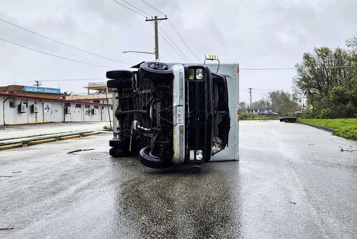 Truck overturned by typhoon