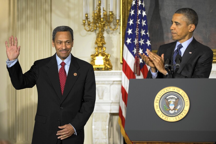 Melvin L. Watt, left, a longtime Democratic congressman from North Carolina, is introduced as President Obama's nominee to be director of the Federal Housing Finance Agency in 2013.