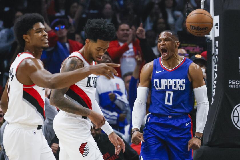 Los Angeles, CA, Wednesday, October 25, 2023 - LA Clippers guard Russell Westbrook (0) celebrates after a slam dunk against the Portland Trail Blazers at Crypto.com Arena. (Robert Gauthier/Los Angeles Times)