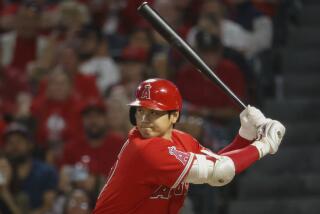 Los Angeles Angels' Shohei Ohtani (17) swings at a pitch 