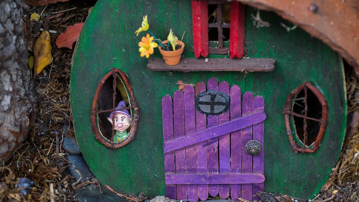 LOS ANGELESA gnome inside a small wooden house is just one the details in Rita Tateel's whimsical fairy and gnome garden in front of her home.