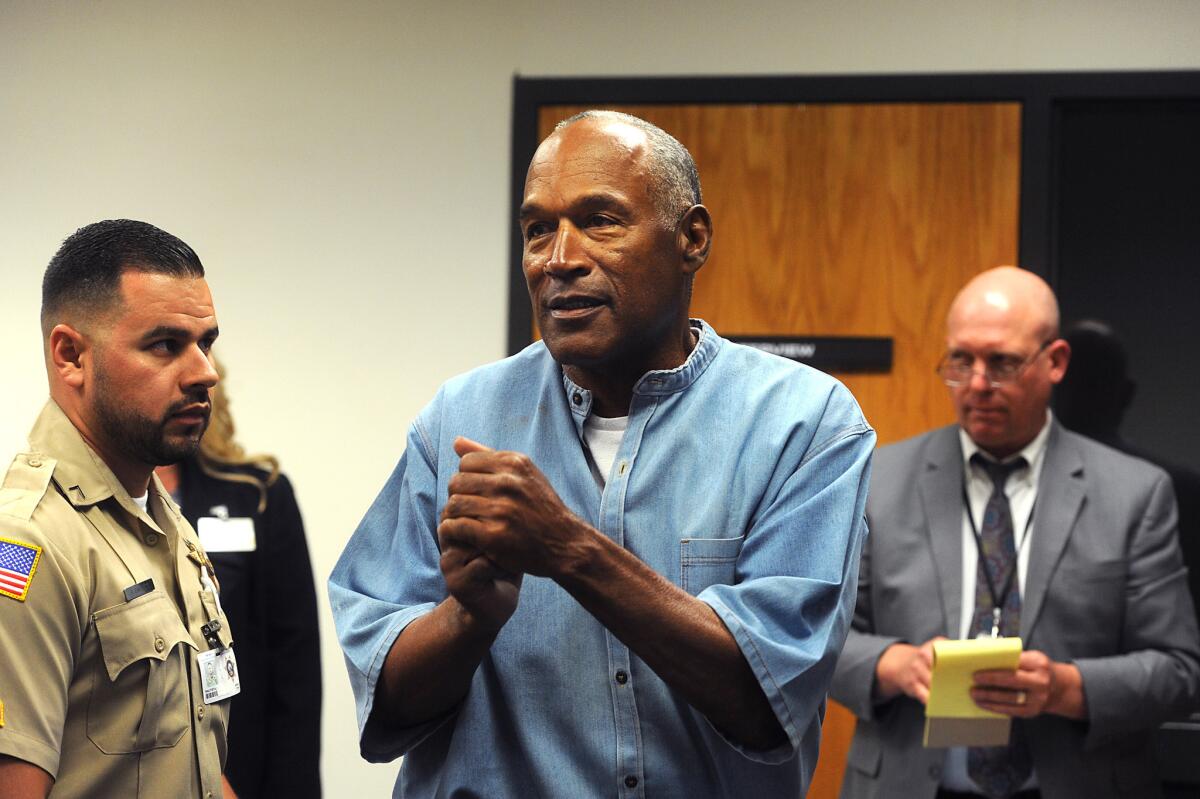 O.J. Simpson reacts after learning he was granted parole at Lovelock Correctional Center in Lovelock, Nevada, on July 20.