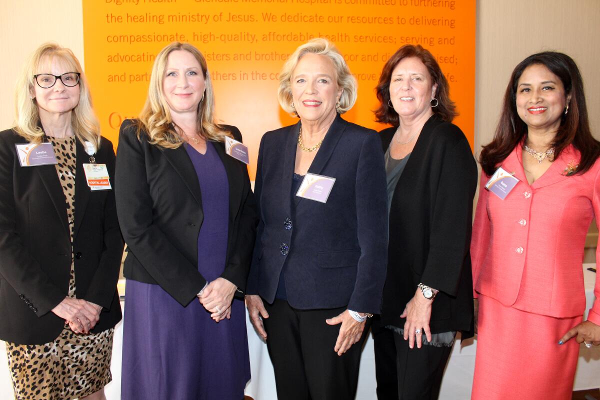 Guest speaker Kathy Rose, center, joins Women of Dignity Health members, from left, Leslie Pech, Lauriann Wright, Jill Welton, Glendale Memorial President and CEO, and Raana Hasnat.