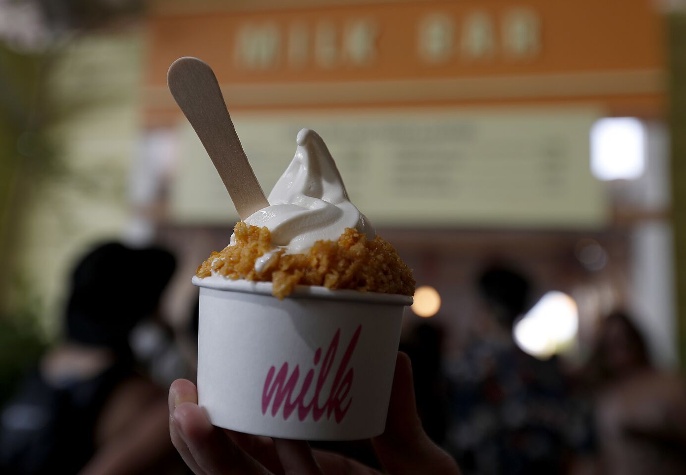 For dessert, Milk Bar offers cereal milk soft serve ice cream.