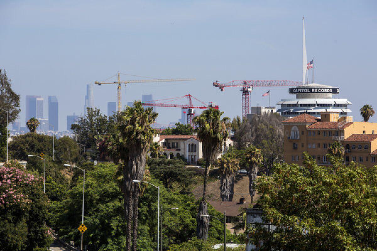 View of Hollywood. A New York-based developer wants to build two new skyscrapers flanking the iconic Capitol Records building.