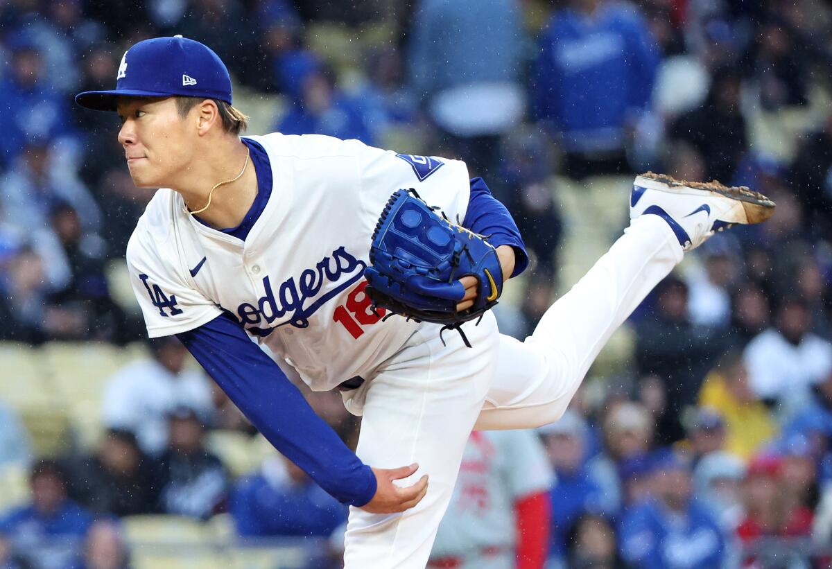 Dodgers pitcher Yoshinobu Yamamoto delivers against the St. Louis Cardinals on March 30.