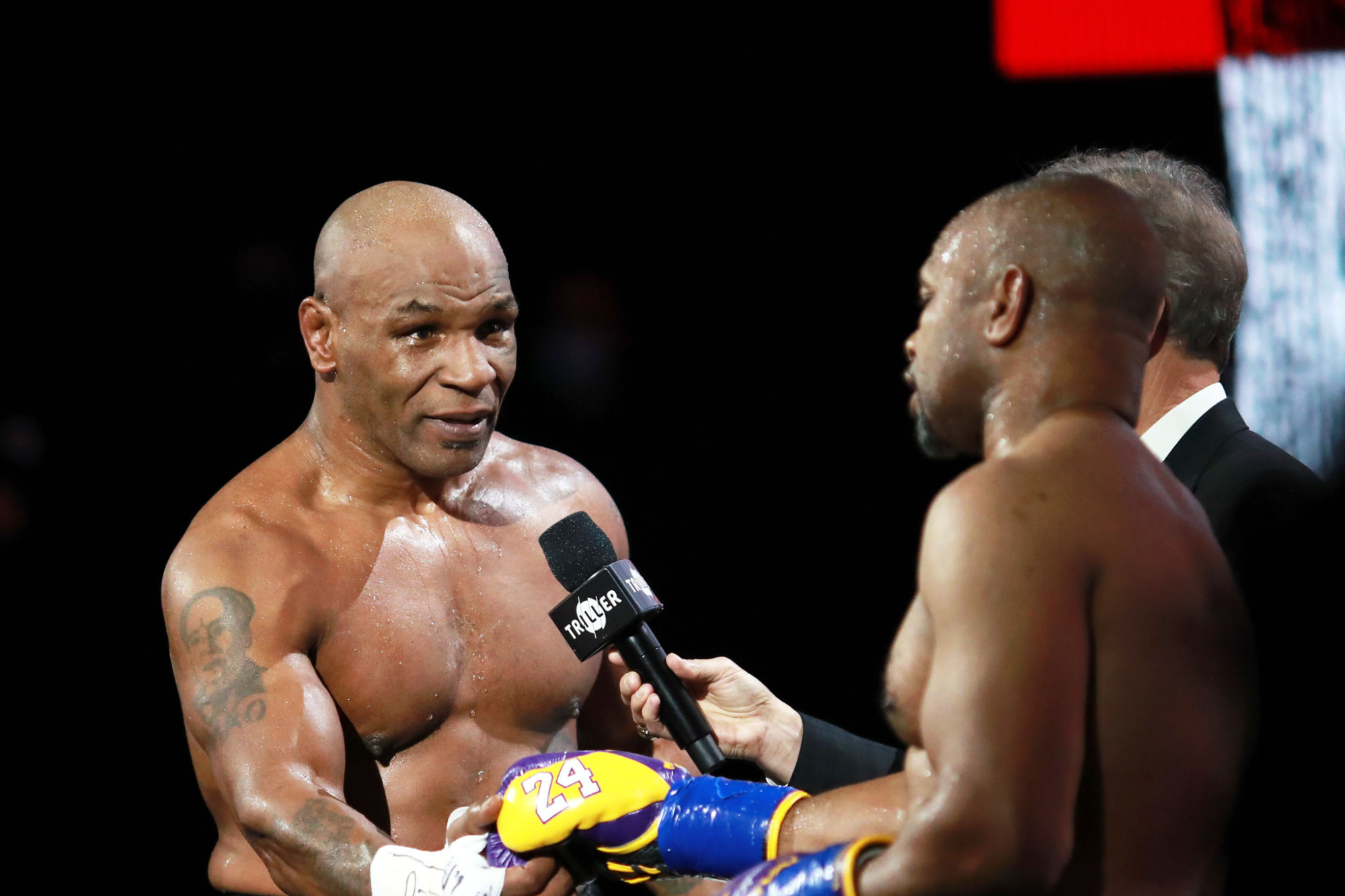 Mike Tyson reacts after receiving a split draw against Roy Jones Jr.