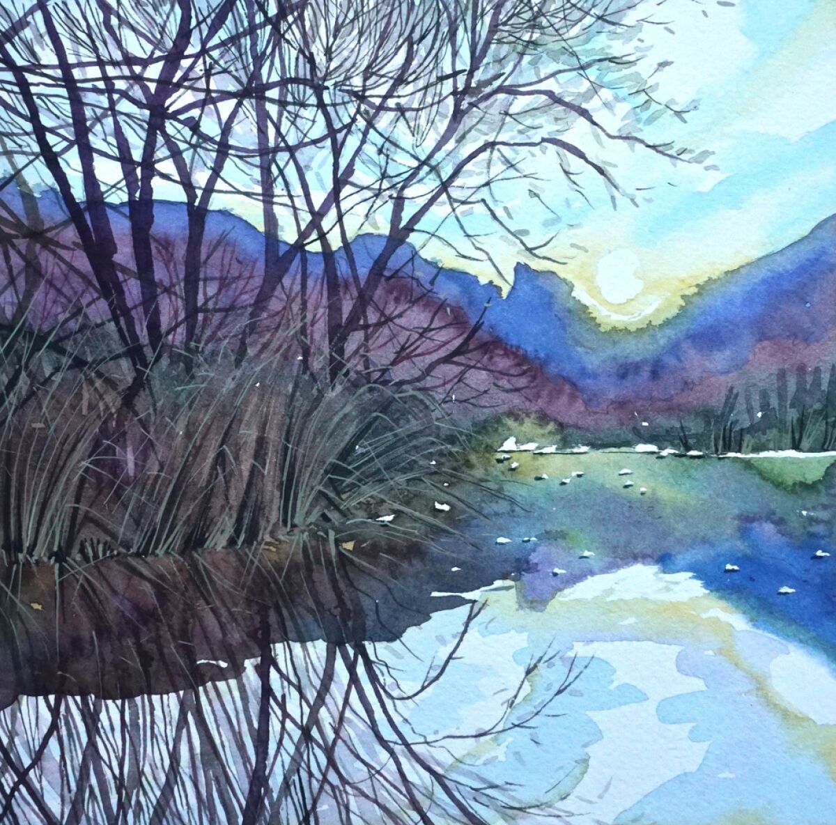 In a watercolor, mountains, setting sun and tree limbs are reflected in a body of water.