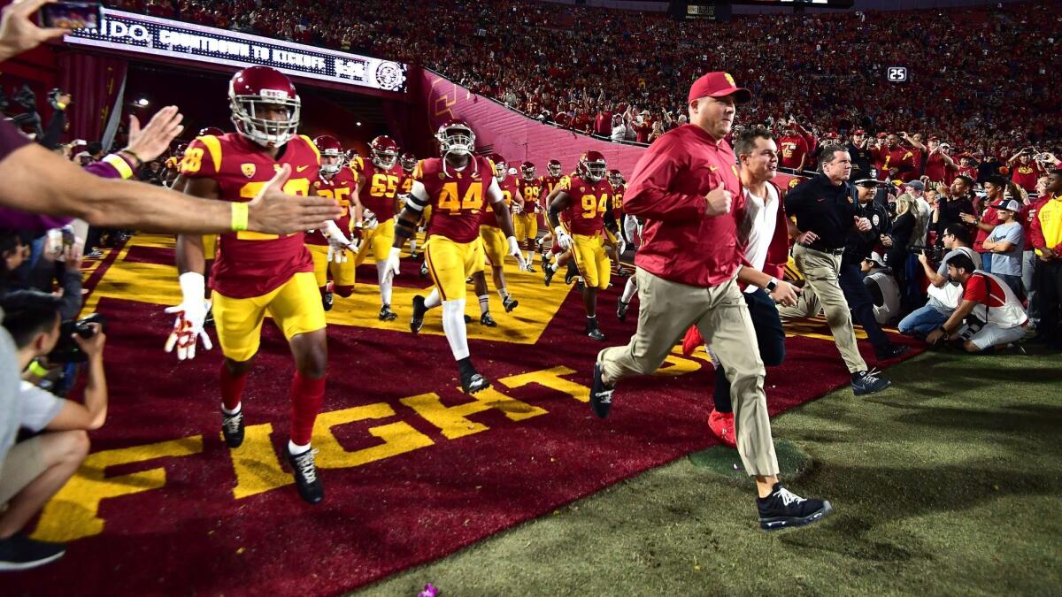 Head coach Clay Helton led the Trojans on to the field to face the Bruins on Saturday night, and when he walked off, he'd accomplished something no one at USC had done in five years. He made it two full seasons as the head coach without getting fired.