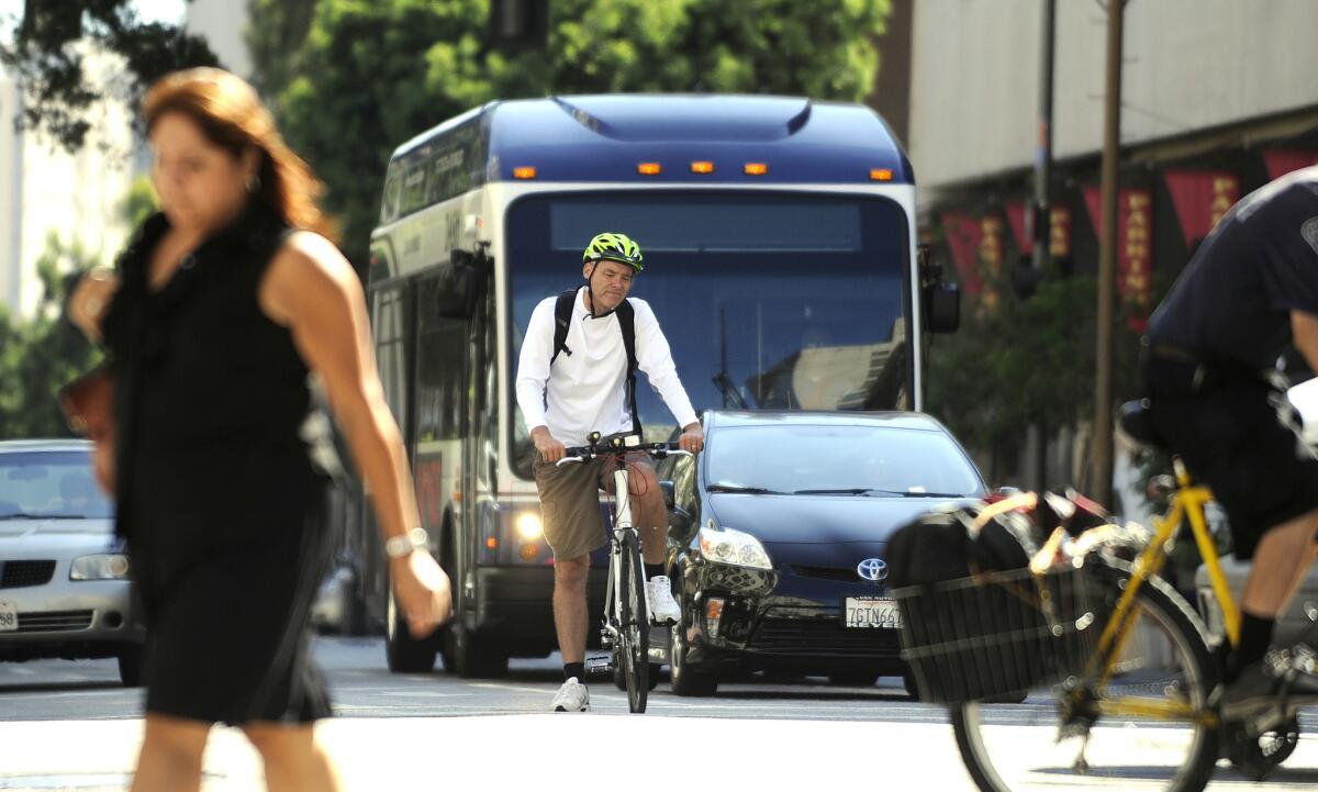 L.A.'s new 20-year transportation plan calls for hundreds of miles of new dedicated lanes for buses and bicyclists.