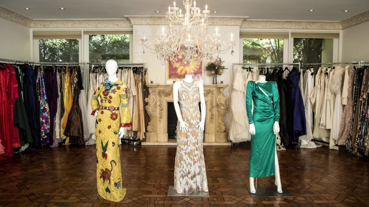 Dresses by Gucci, from left, Zuhair Murad and Alessandra Rich are among the 7,000 items that can be "checked out" of the Albright Fashion Library LA for an event.