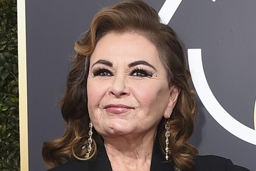 FILE - In this Jan. 7, 2018 file photo, Roseanne Barr arrives at the 75th annual Golden Globe Awards in Beverly Hills, Calif. Barr is blaming a racist tweet that got her hit show canceled on the insomnia medication Ambien, prompting its maker to respond that "racism is not a known side effect." (Photo by Jordan Strauss/Invision/AP, File)