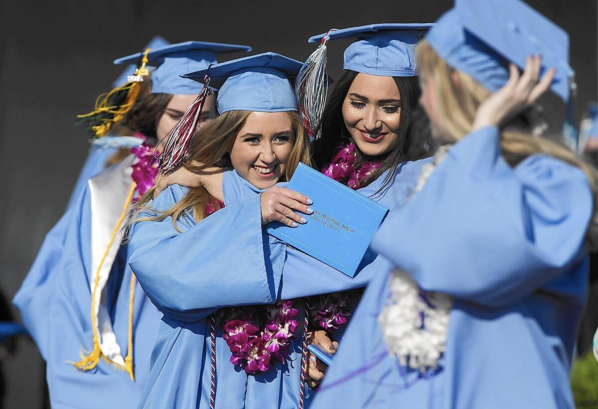 Happy graduates revel on the red carpet after getting their diplomas during the 53rd annual commencement ceremony at Corona del Mar High School in 2016.