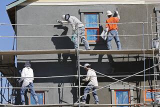 OCTOBER 31, 2013. IRVINE, CA. A team of masons put the finish coat of stucco on a two-story house in the Pavillion Park neighborhood of new homes in the Great Park, Irvine, CA. (Don Bartletti / Los Angeles Times)
