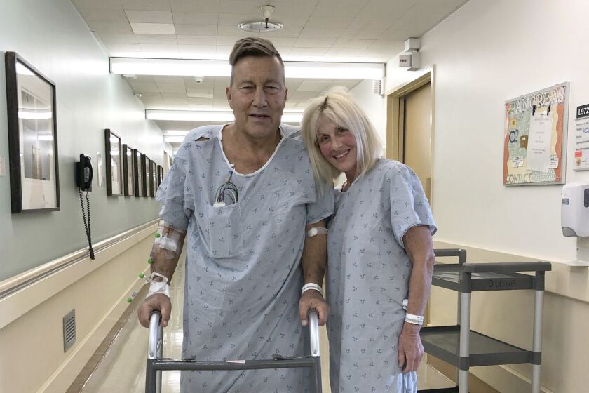 Herb Hoeptner and his wife, Diane, at the UCSF hospital in San Francisco the day after she donated one of her kidneys to him. Organ transplants have plummeted as COVID-19 swept through communities.