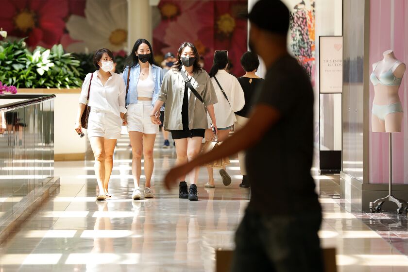 COSTA MESA-CA-JUNE 15, 2021: Shoppers at South Coast Plaza in Costa Mesa on Tuesday, June 15, 2021. (Christina House / Los Angeles Times)
