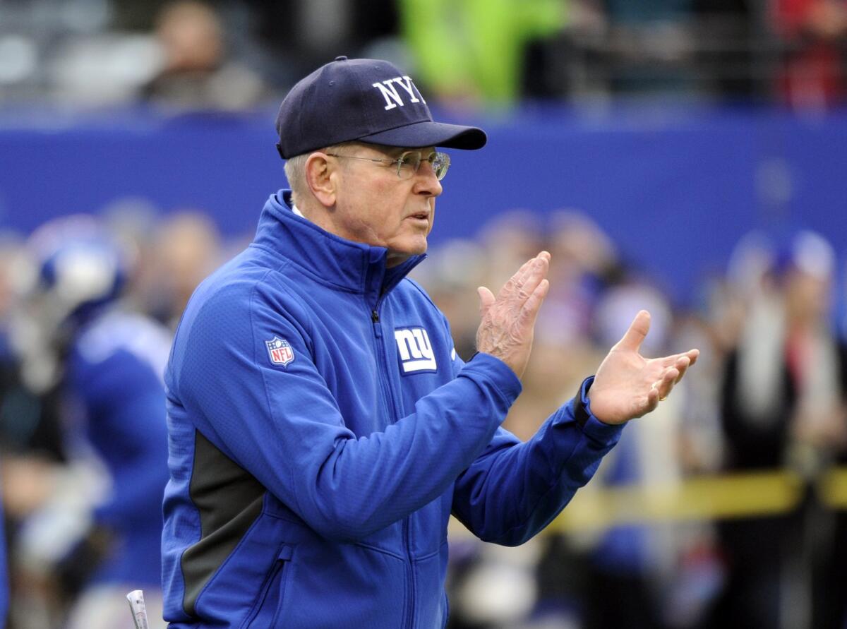 New York Giants Coach Tom Coughlin watches his team warm up before a Dec. 28 game against the Philadelphia Eagles in East Rutherford, N.J.