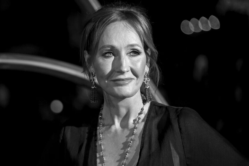 FILE - In this Nov. 13, 2018 file photo, author J.K. Rowling poses for photographers upon her arrival at the premiere of the film 'Fantastic Beasts: The Crimes of Grindelwald', in London. JK Rowling is publishing a new story called “The Ickabog,” which will be free to read online to help entertain children and families stuck at home during the coronavirus pandemic. The “Harry Potter” author said Tuesday May 26, 2020, that she wrote the fairy tale for her children as a bedtime story over a decade ago. (Photo by Joel C Ryan/Invision/AP, File)