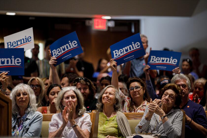 NORTHRIDGE, CALIF. -- TUESDAY, AUGUST 6, 2019: Senator Bernie Sanders's supporters cheer as he hosts a town hall meeting at Temple Ahavat Shalom in Northridge, Calif., on Aug. 6, 2019. (Marcus Yam / Los Angeles Times)